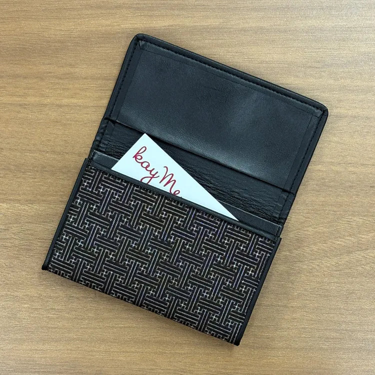 Elevating the brief moment of exchanging business cards into a