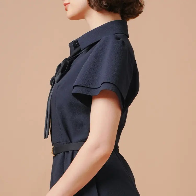 Bell sleeves create a feminine slimming effect.