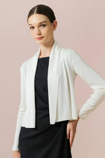 white bolero over a black dress