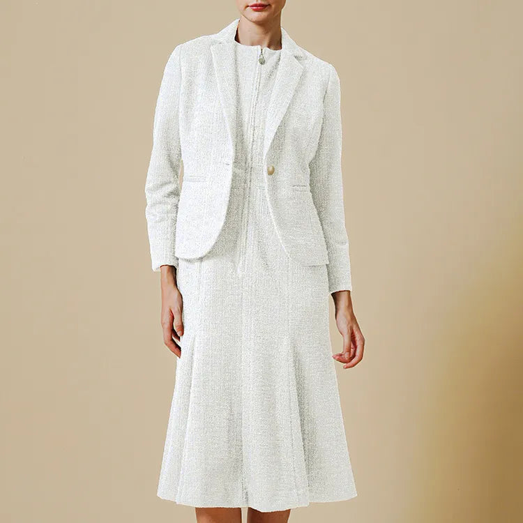 Pair it with a dress made of the same material for a gorgeous set.