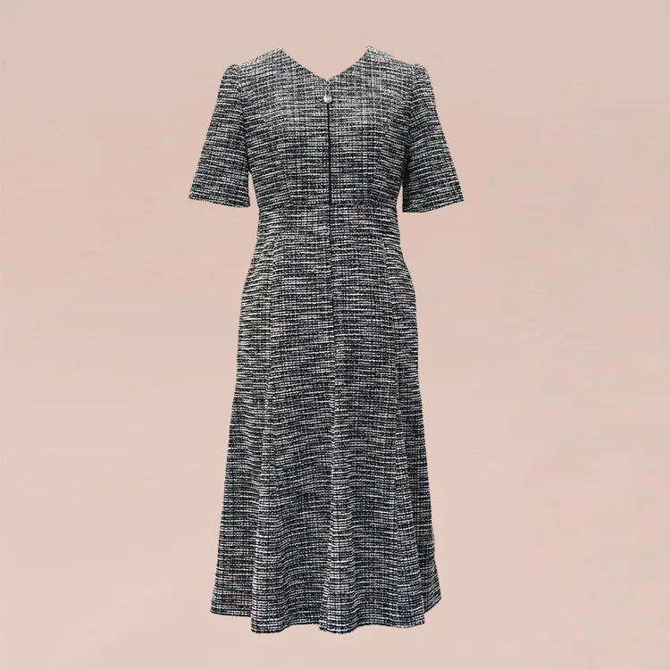 Pair it with a dress made of the same material for a gorgeous set.