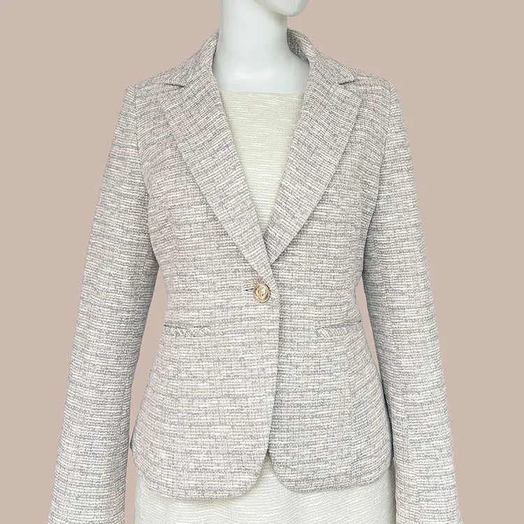 A sophisticated piece that creates a slimming facial effect while embodying refined elegance