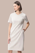 Smart Stretch V-neck Essential Dress in black, a knee-length, short-sleeved knit dress.