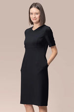 V-neck Essential Dress in Space Material, a deep navy blue, sleeveless midi dress with a simple A-line silhouette.