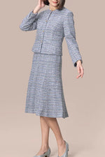Boucle tweed zip-up dress in a classic silhouette.