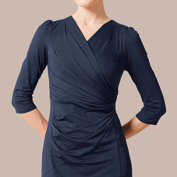 The sophisticated visual effect created by a gentle cinch and elegant curve silhouette