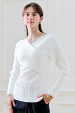 White Cross Knit Top, a washable knit top with a subtle cross pattern.
