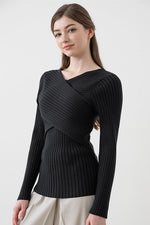Black washable knit top, a versatile and comfortable garment for everyday wear.