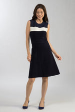 Washable Knit: Milano Rib Navy Dress, a knee-length navy blue dress with a subtle ribbed texture.