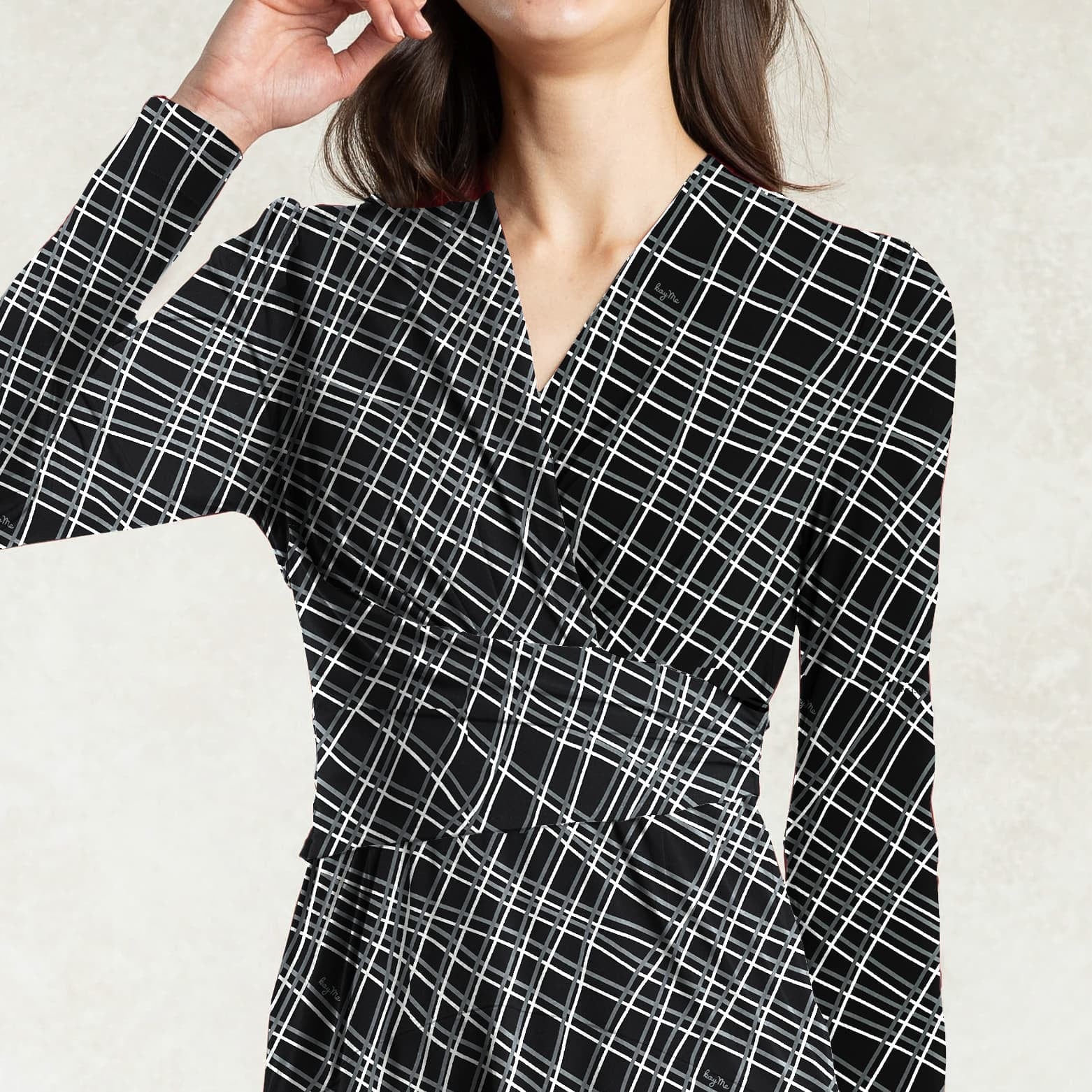The wrap top and A-line design create a super feminine impression.
