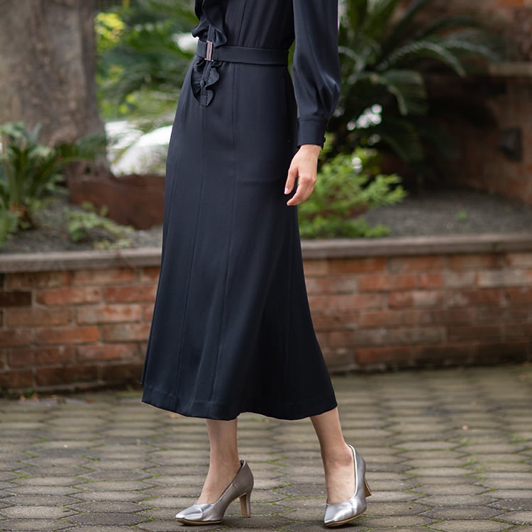 The 8-panel skirt creates a slimming effect