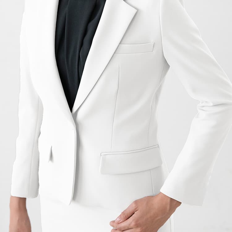 A silhouette that looks genuinely sharp while leaving room in the sleeves