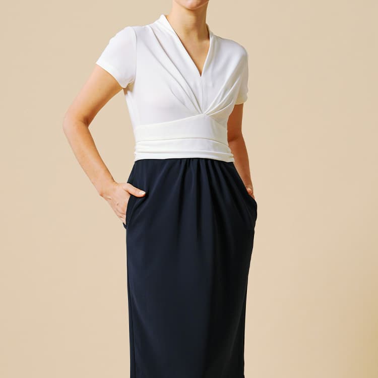 A compact silhouette that balances structure and body coverage.