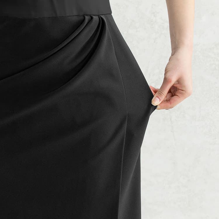 The skirt features wrinkle-resistant, washable Smart Stretch fabric suitable for year-round use