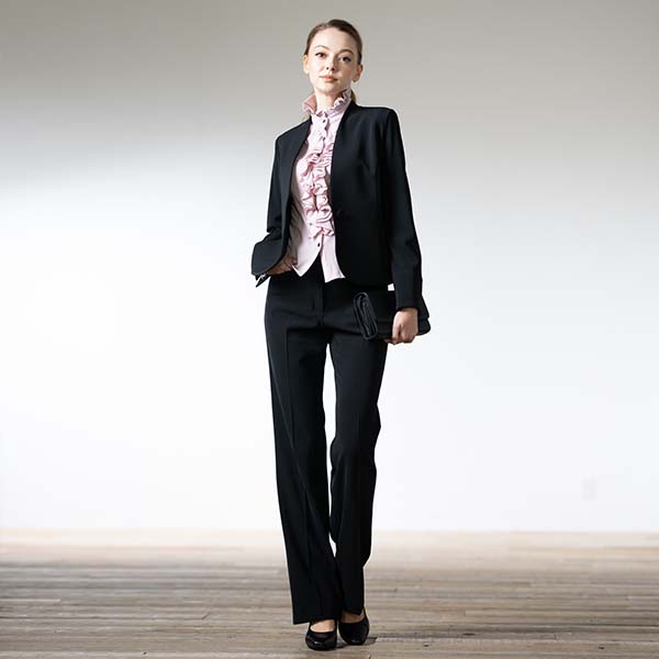 A ruffled top makes a pantsuit look even more glamorous