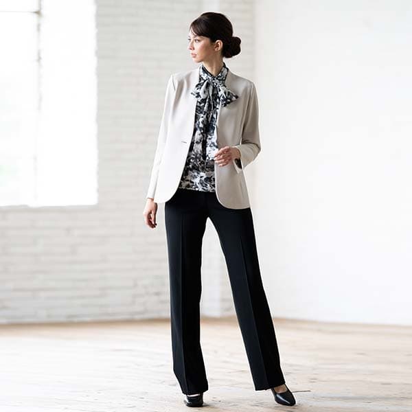 A grey jacket creates a soft impression