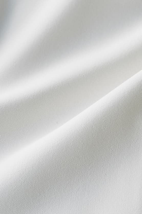 All-Season Material: Smart Stretch Front Vent Skirt