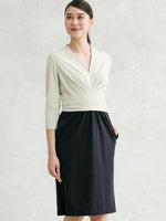Gray and navy docking shell dress, a stylish, modern dress with a unique color block design.