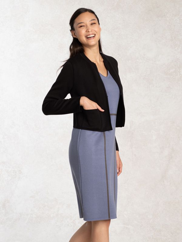 A blue washable knit dress with a crew neck and short sleeves.