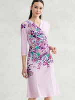 Stretch Jersey Bloom Gathered Dress in a vibrant floral print, featuring a flowing silhouette and gathered waist.