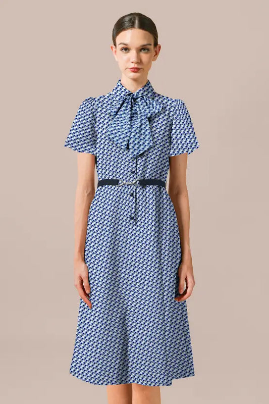 Stretch Chiffon Crystal Bow-Tie Shirt Dress with a classic white button-down silhouette and sparkling crystal bow-tie detail.