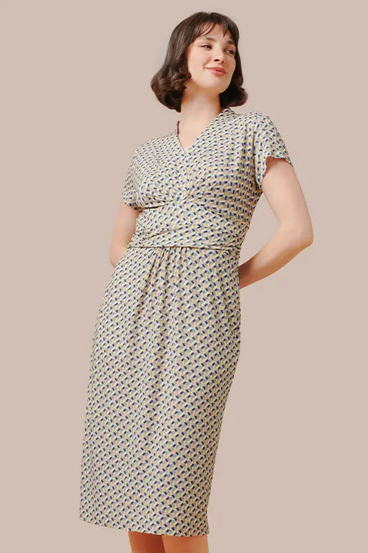 Stretch Jersey Prism Shell Dress in a vibrant, abstract prism print with a relaxed fit.