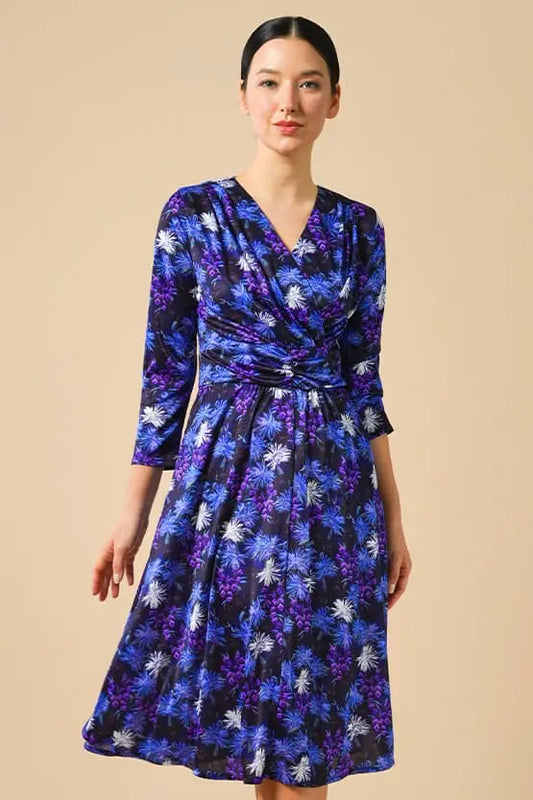 Night Margaret Marilyn Dress: A black, floor-length gown with a plunging neckline and thigh-high slit.