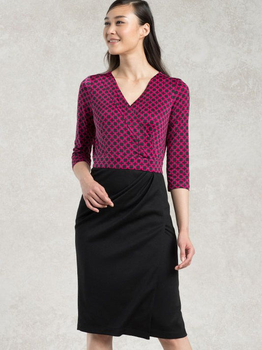 Wool Blend Double Face Pink Circle X Black Asymmetry Dress on a mannequin, showcasing its unique design.