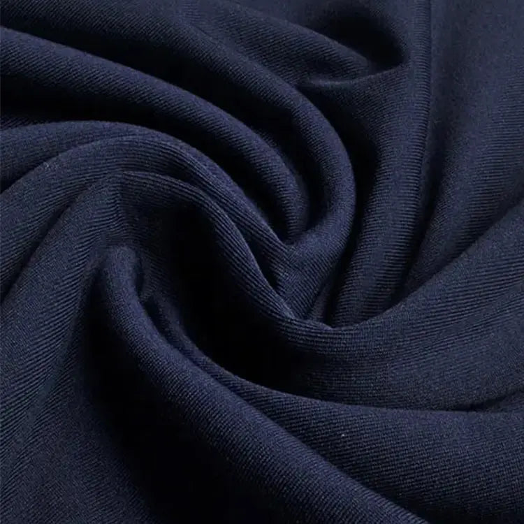 Proprietary high-performance stretch jersey — elegantly maintains body warmth while creating beautifully flowing drape lines