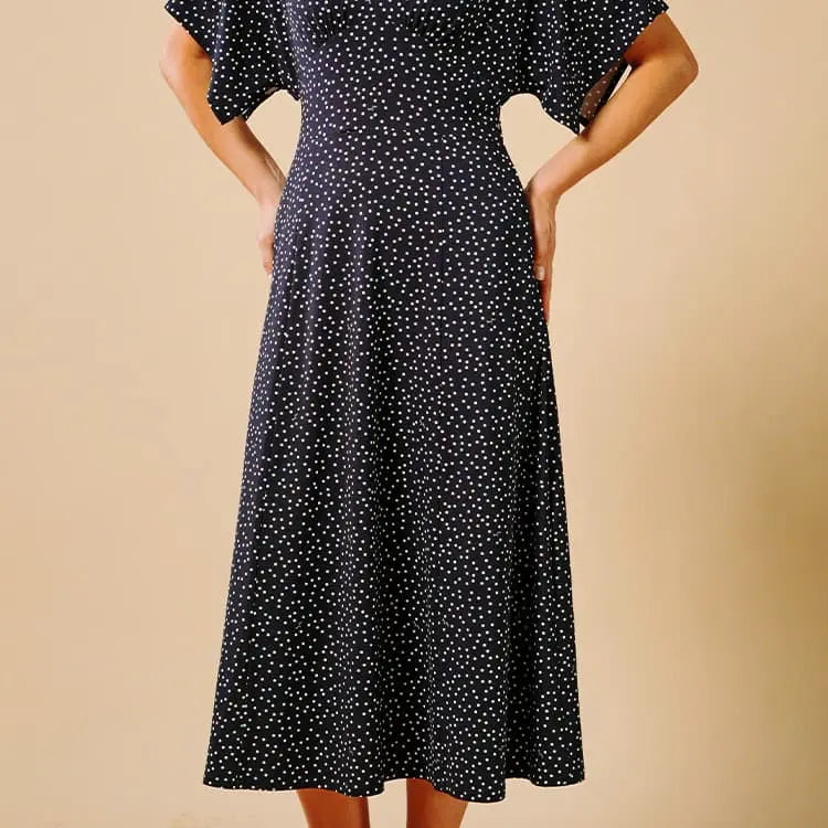 A flared silhouette that accentuates femininity