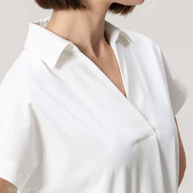 Collared V-neck for a clean look around the face