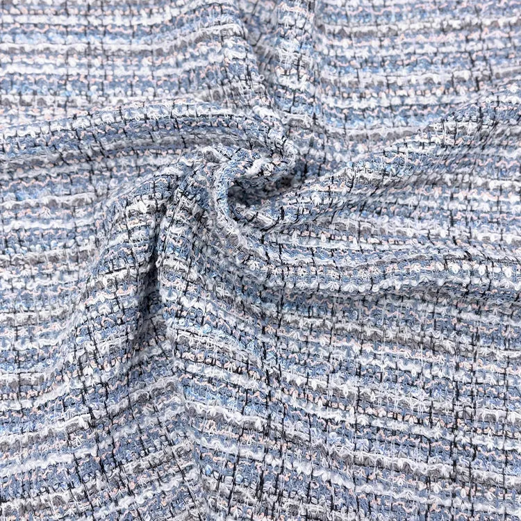 Washable stretch fabric. A refined new tweed style, crafted with Japanese technology