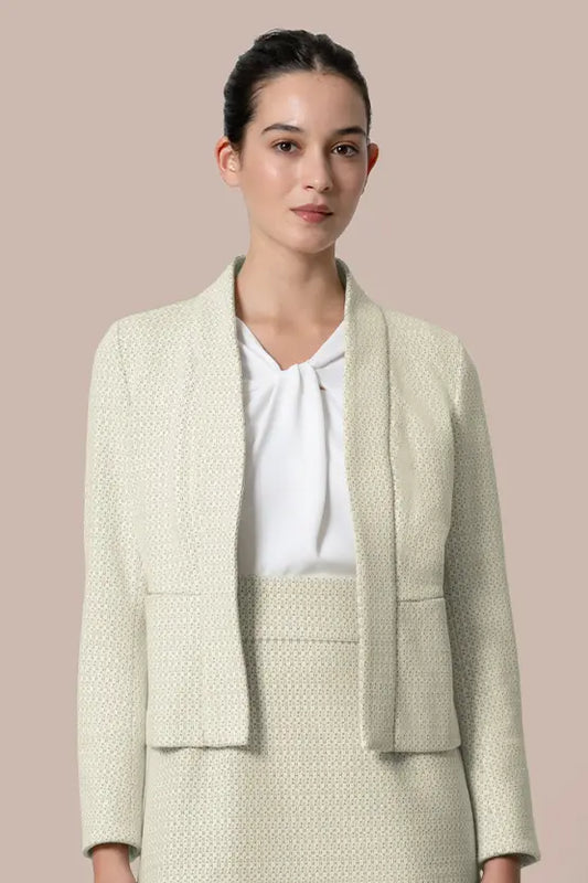 Lame Jacquard: Bolero-Length Jacket, a shimmering, cropped jacket with intricate jacquard detailing and a wide collar.