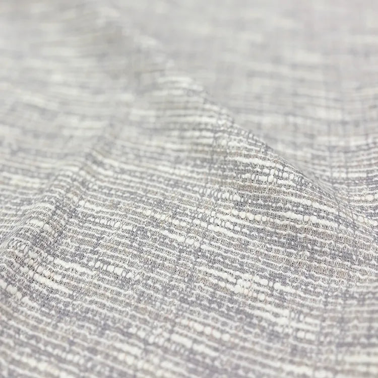 Washable stretch fabric. A refined new tweed silhouette, crafted with Japanese technology.
