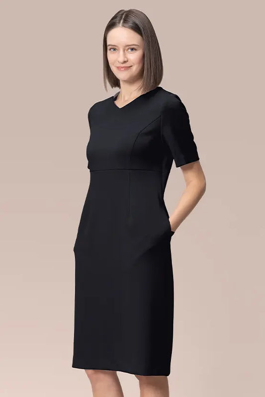 V-neck Essential Dress in Space Material, a deep navy blue, sleeveless midi dress with a simple A-line silhouette.