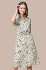 Collared cache-coeur dress in stretch chiffon, featuring a crossover front and flowing skirt.