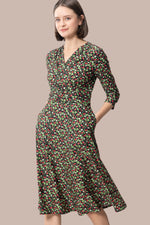 Mimorin Dress in stretch jersey, a flowing midi dress with a relaxed fit and subtle sheen.