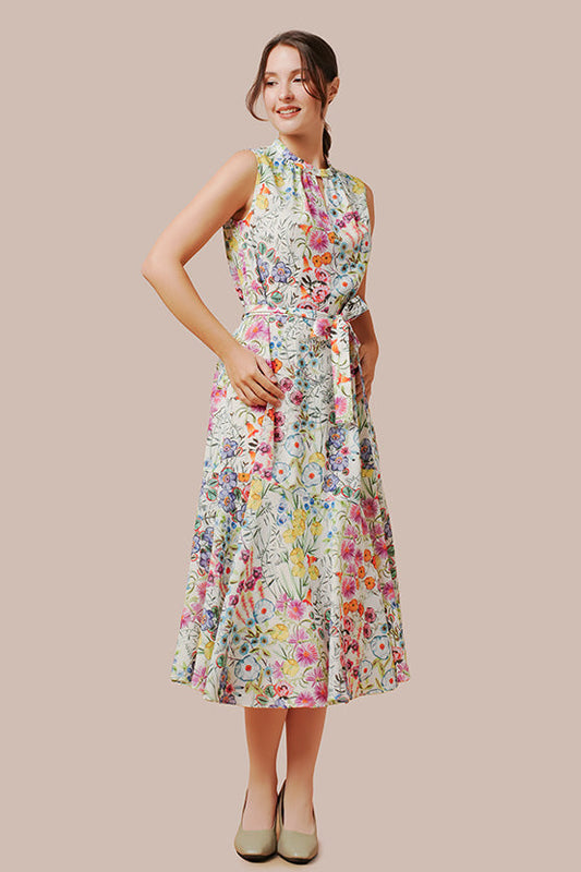Woman wearing a sleeveless floral midi dress