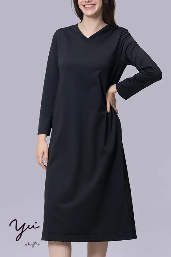 Wellness Tech 2-Way Front and Back Dress: A woman models a versatile black dress with a V-neckline in front and a scoop neck