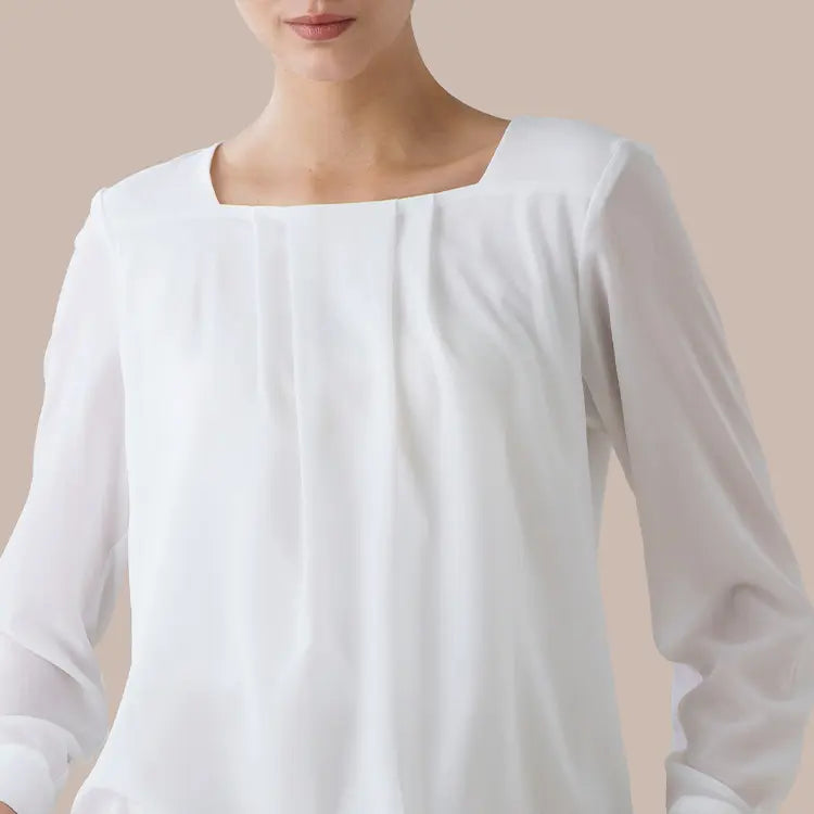 The elegant round neckline beautifully frames your face, creating a graceful and radiant impression.