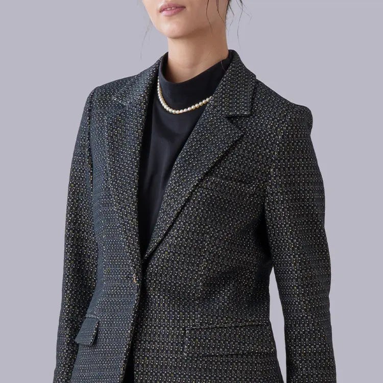 An elegant essential layer with a sophisticated side-shirred neckline