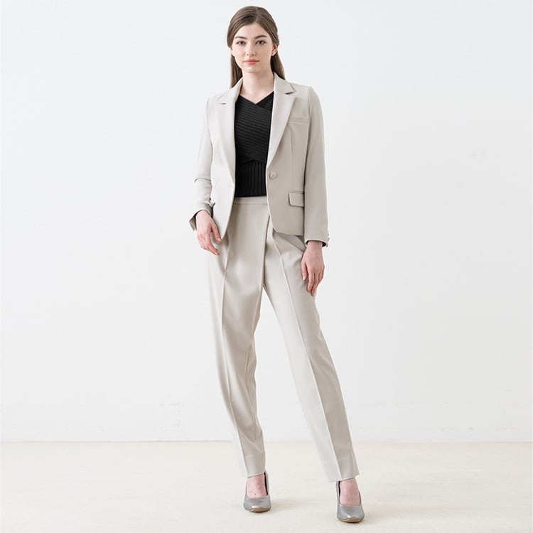 Create a vertical visual effect with a pantsuit