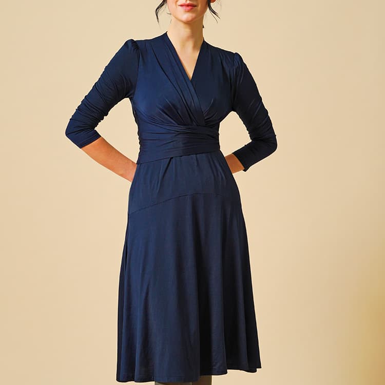 The wrap top and A-line create a super feminine look.