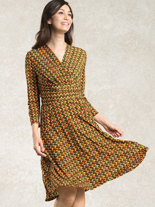 Bronze Pine Cache-Coeur Dress: A flowing, deep V-neck wrap dress in a rich bronze hue with a subtle pine-like texture.