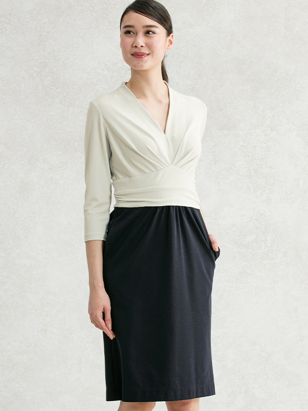 Gray and navy docking shell dress, a stylish, modern dress with a unique color block design.