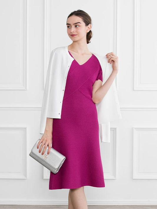 Sweet Potato Cross Knit Dress in a rich, warm hue, showcasing its textured knit and flattering cross-front design.