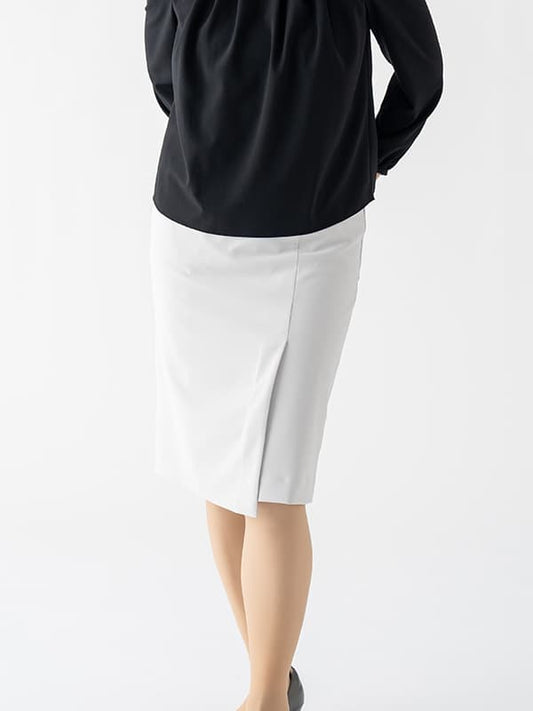 Active Cool: Cooling White Wrap Skirt, a versatile white wrap skirt with a flowing silhouette.