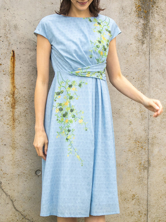 light blue short-sleeve midi dress with green floral embroidery