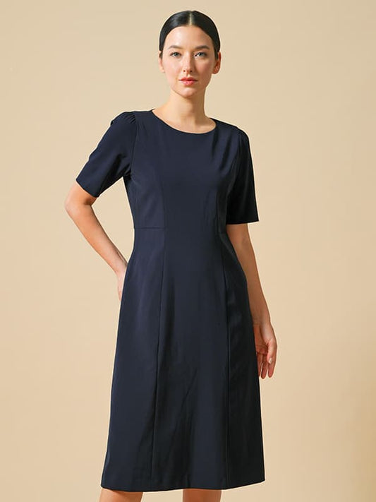 Woman wearing a navy short-sleeve A-line dress