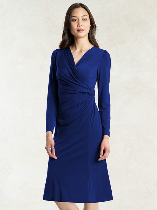 Royal blue gathered dress with anti-static petticoat, elegant and flowing design.